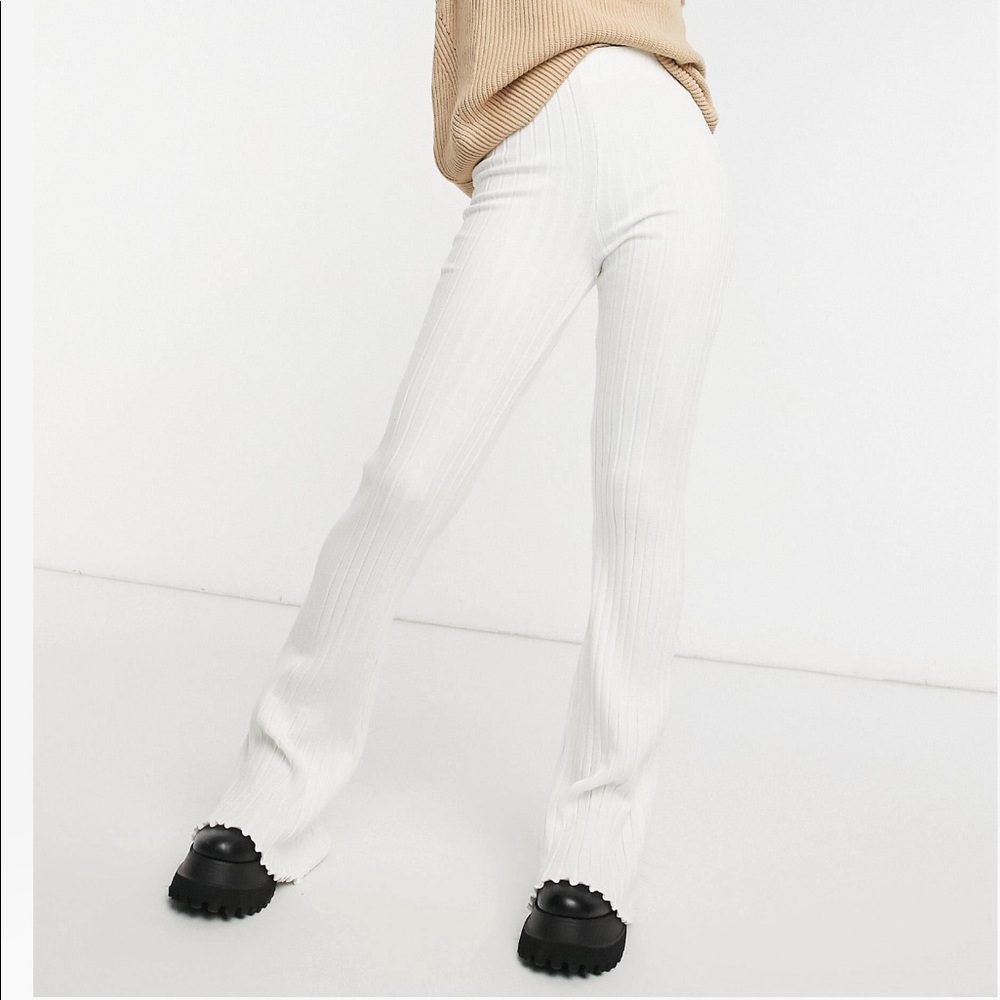 Flared white pants